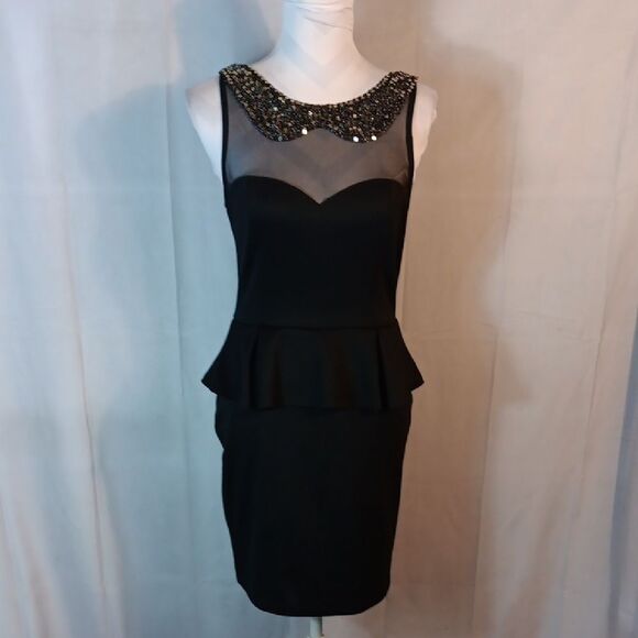 Elegant Black Peplum Dress with Illusion Sequined Neckline - Picture 1 of 7